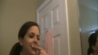 Nikki brushes her teeth and gums using only her finger *** ***