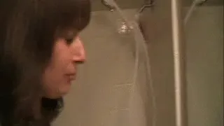 Renee snorts snot out of her sinuses, gags, and hocks loogies on the mirror
