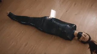 Home girl completely wrapped and mummified with a PVC tape ( LOW BITRATE)