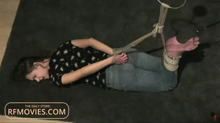 Leya is tied up and gets whipped on her bare feet