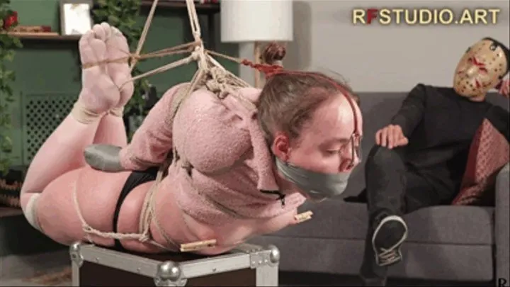 Arina - Incredibly tight hogtie in a semi-suspension, tape gag, nose hook, and nipple clamps