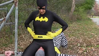 Bat Girl Pins His Face