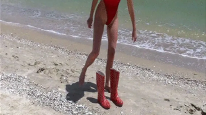 Red Rubber boots and red sexy swimsuit in the sea