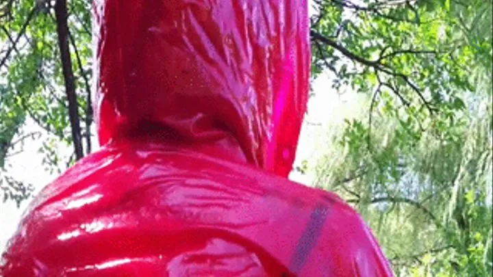 Outdoors in red plastic lingerie and jacket