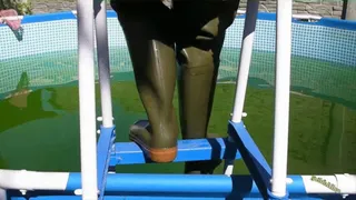 Alina and Christina in Waders in a pool