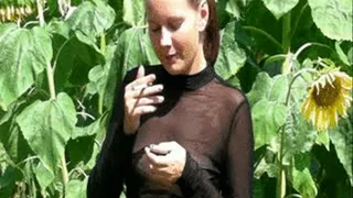 Jackie in transparent Top smoking outdoors