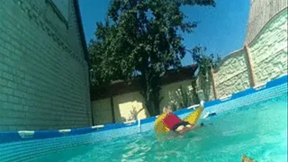 Satin Blouse, Nylons and Miniskirt Striptease in a pool - underwater