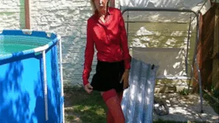With Satin Blouse, Mini Skirt and Nylons in a pool
