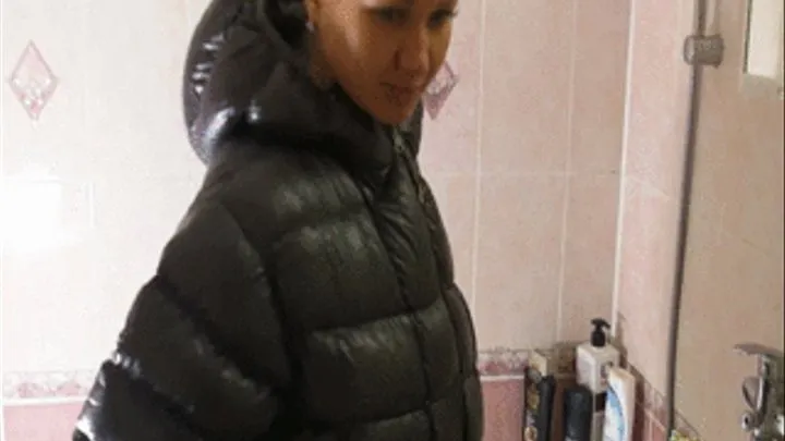 Christina takes a shower in down jacket and Slinkystylez Leggins