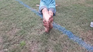 Dirty soles in soccer field