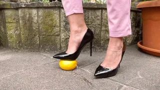 nuj23 Two juicy oranges under Alexas high heels
