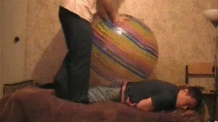 2 boys on 2 beachballs