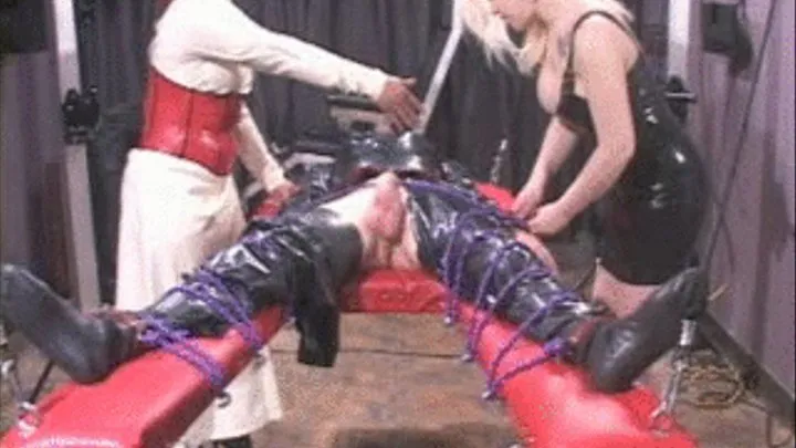 Rubber slut gets tag teamed