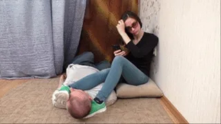 Lying on the floor man allows student girl to put her legs on him, vf1666x