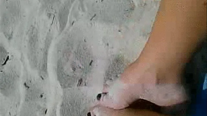 Toe tickling in the Sand