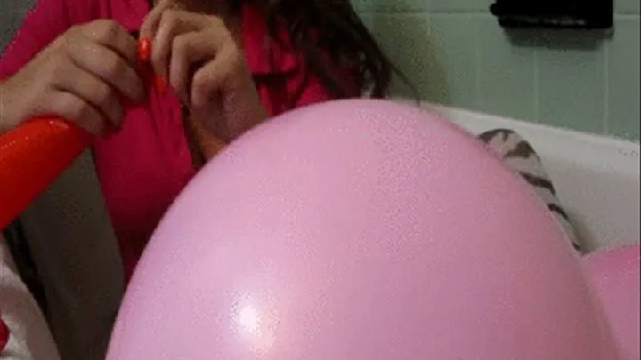 Close Up Balloon Blowing Hand Tieing