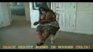 Big Busty Black Bound Beauty struggles in Wooden Chair! 3gp