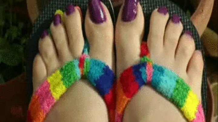 Feet with purple polish & flip flop