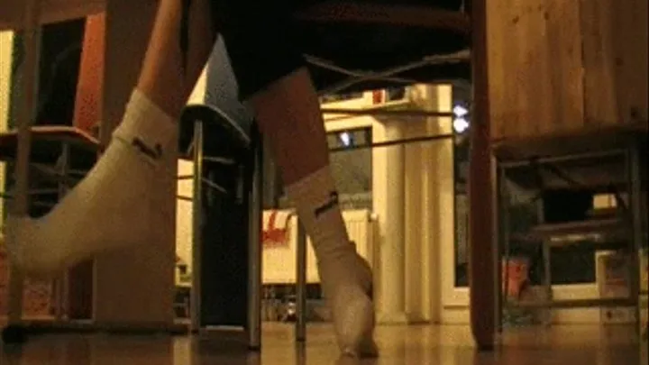 C 82 White Puma socks of a college girl in the main room