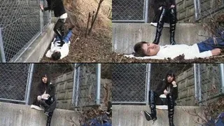 Man is on the ground, while domina is trampling on his weak body - Part 2 ( - AVI Format)