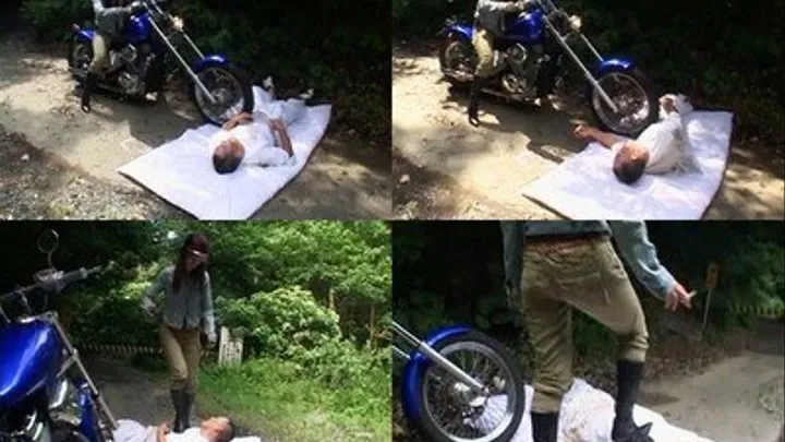 Domina rolls her motorcycle on poor man's belly before she completely beats him - Part 1 ( - AVI Format)