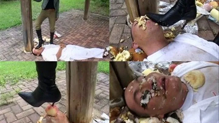 Domina uses the heels of her boots to crush food on man's face - Full version ( - AVI Format)