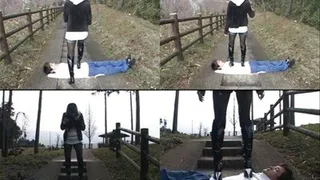 Domme steps on man's body as she steps on the stairway! - Full version ( - AVI Format)