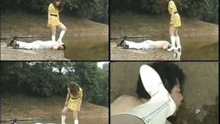 Domina beats man with her boots by the shore! - Part 1 - AVI Format