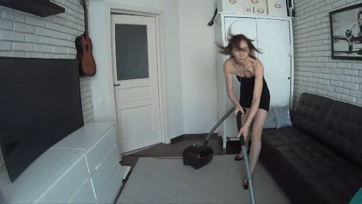 Vacuuming in high heeled shoes (L)