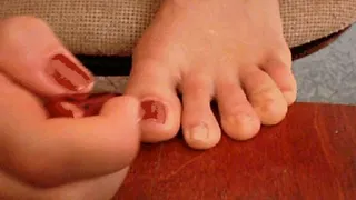 Attraction of red toenail polishing