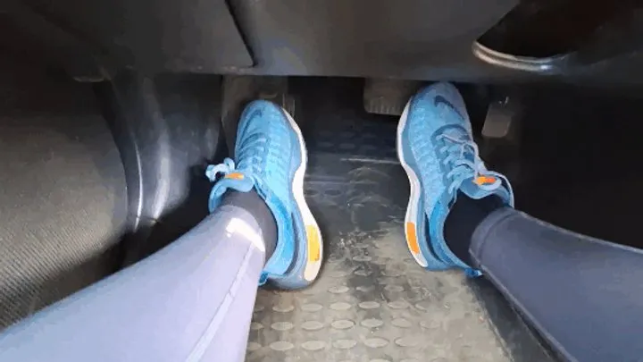 Car driving in nike sneakers