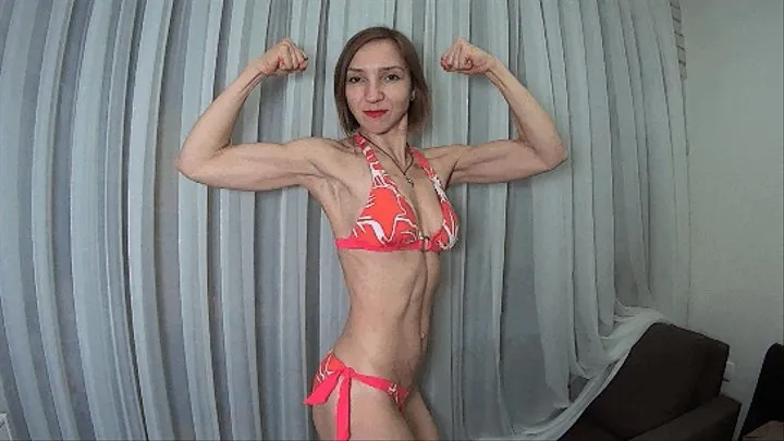 Muscles posing in bright bikini (Bi)