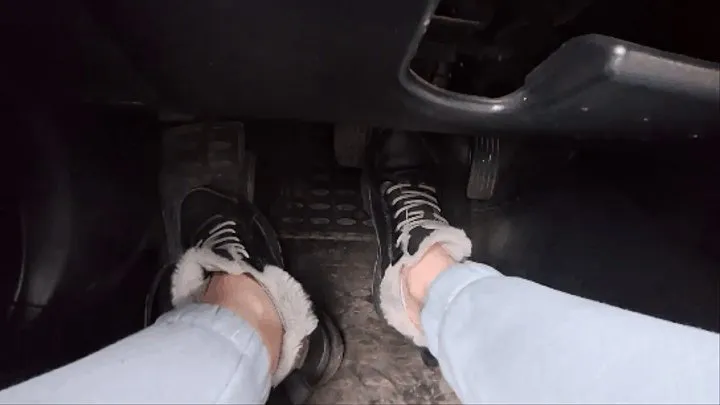 Automatic car driving in winter sneakers