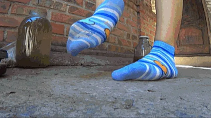 RUBBING SOCKS ON CONCRETE UNTIL THEY HAVE MANY HOLES 2