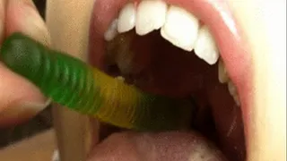 Vore - Young Biting Girl Swallows Gummies into her wide open mouth