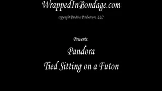 Pandora Tied Sitting on a Futon