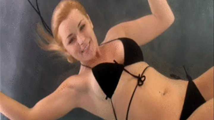 Phoebe underwater topless