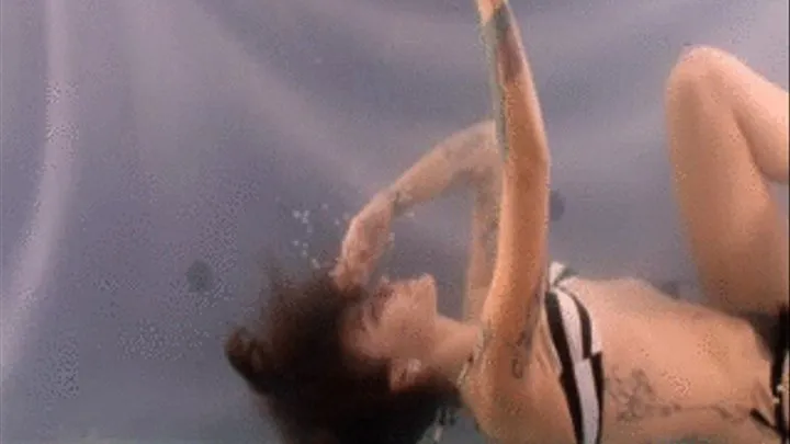 Kayla underwater stripping and nude contortion.