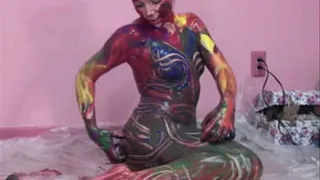 Kinky coed Lina is covered in paint