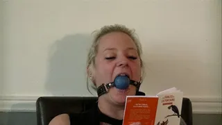 Gagged, reading and spitting 1