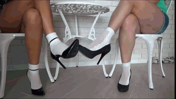 Toe Kissing in sexy pumps under table CLF