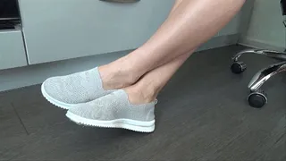 Victoria wiggling toes in skinny sneakers ON