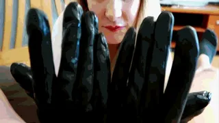 She is milking a man with gloves