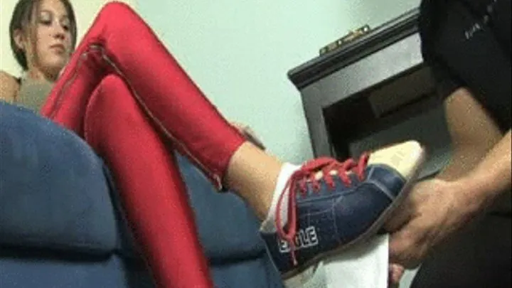 Sexy Rochelle is wearing shiny tight red pants as she rest on the couch allowing her pathetic gay slave boy lick the nasty bottoms of her bowling shoes