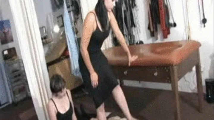 Mistress CeCeLaRue tramples her slave girl while another slave is kissing her feet