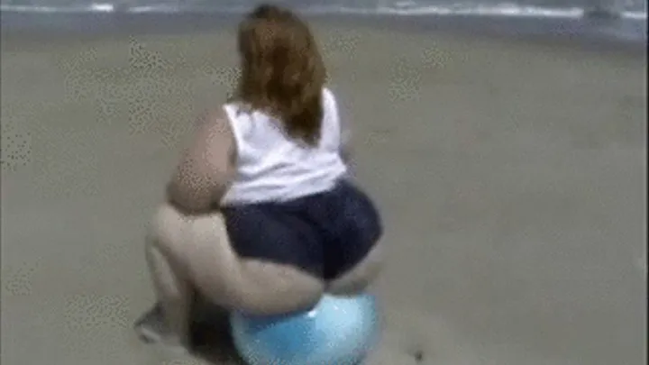 SSBBW bounces on ball at the beach