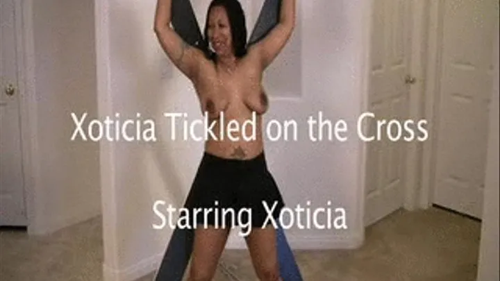 Xoticia Tickled on the Cross