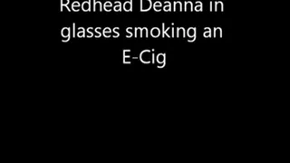 Deanna Smoking an E-Cig in glasses