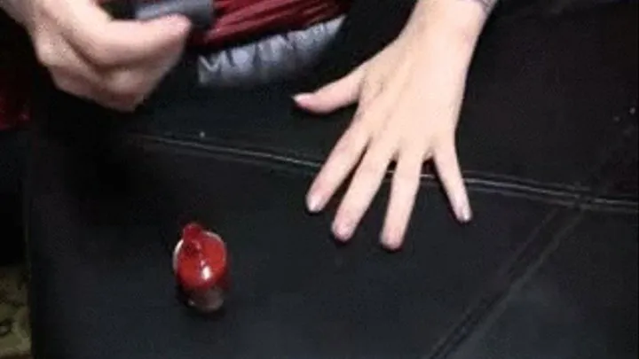 Deanna paints her finger nails RED!