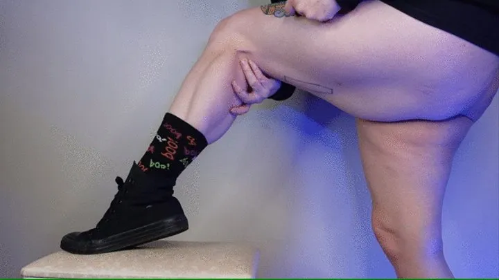 Muscular Calves in All black Converse and Halloween Socks